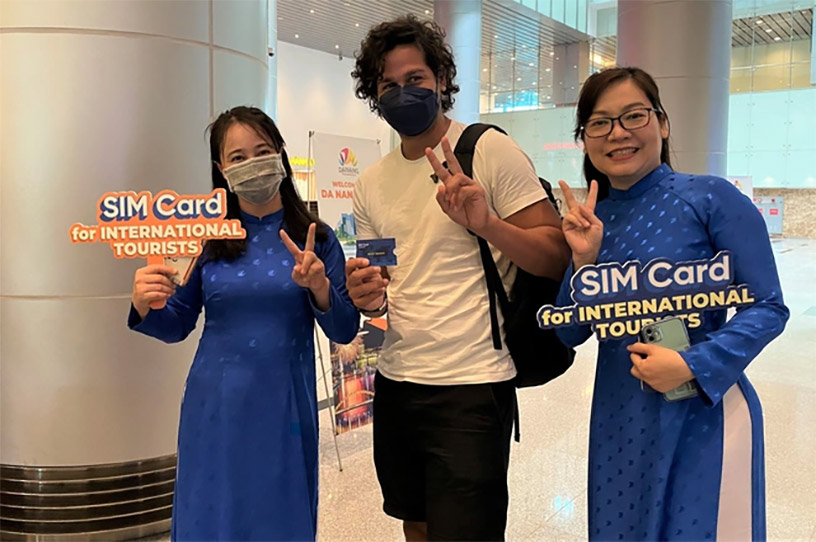 A customer is given a simcard upon arrival at the airport in Vietnam