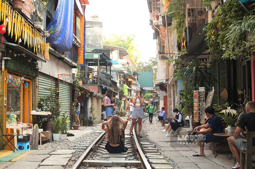 Tourists often take photos on the railway tracks